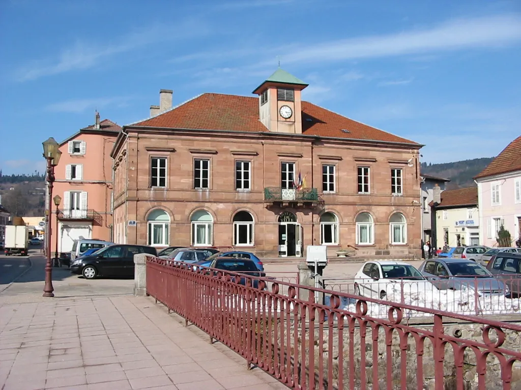 City hall made of pink stone in Fraize (France).